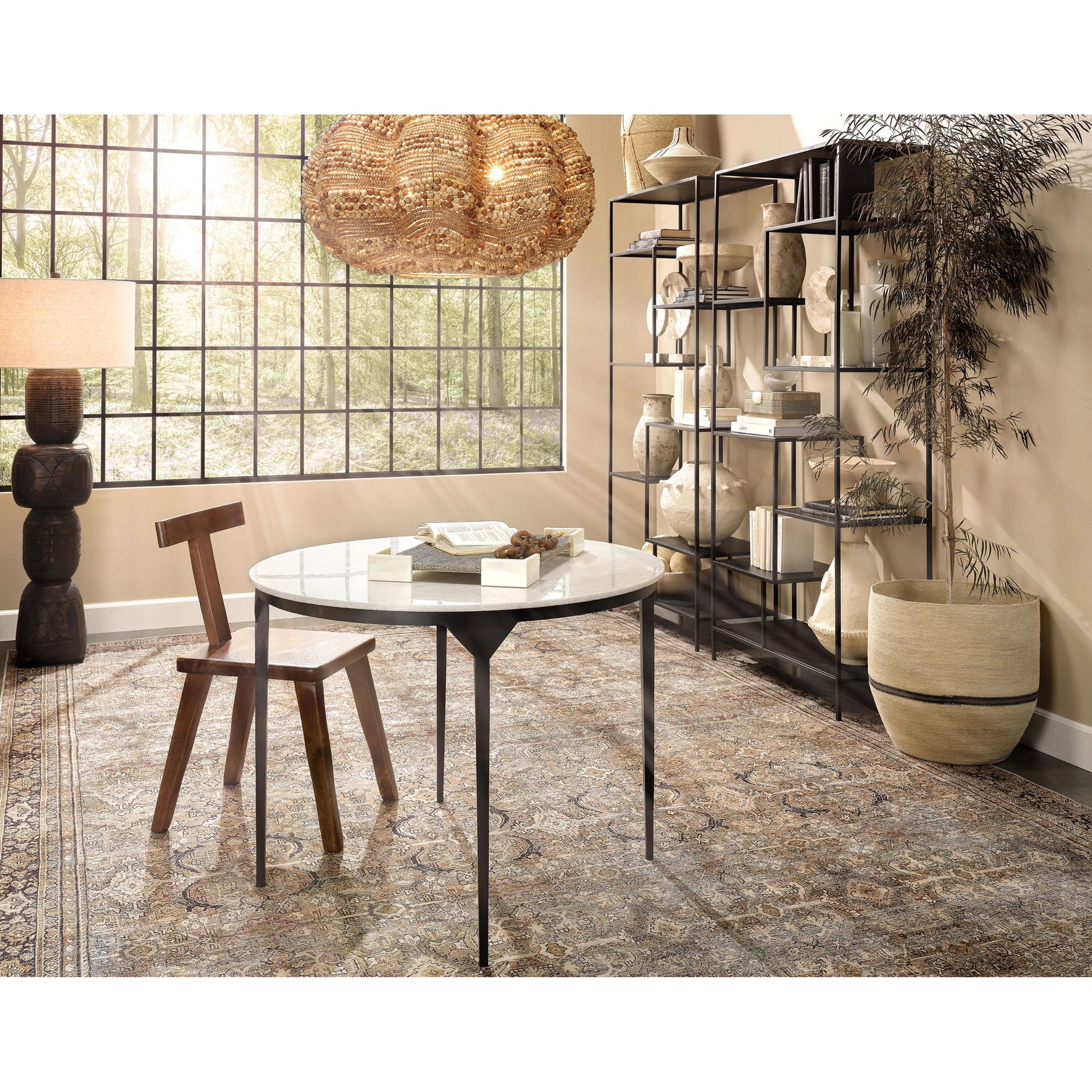 Dante Dining Table by Jamie Young in white, black. Made from white marble, metal: iron in a modern style.