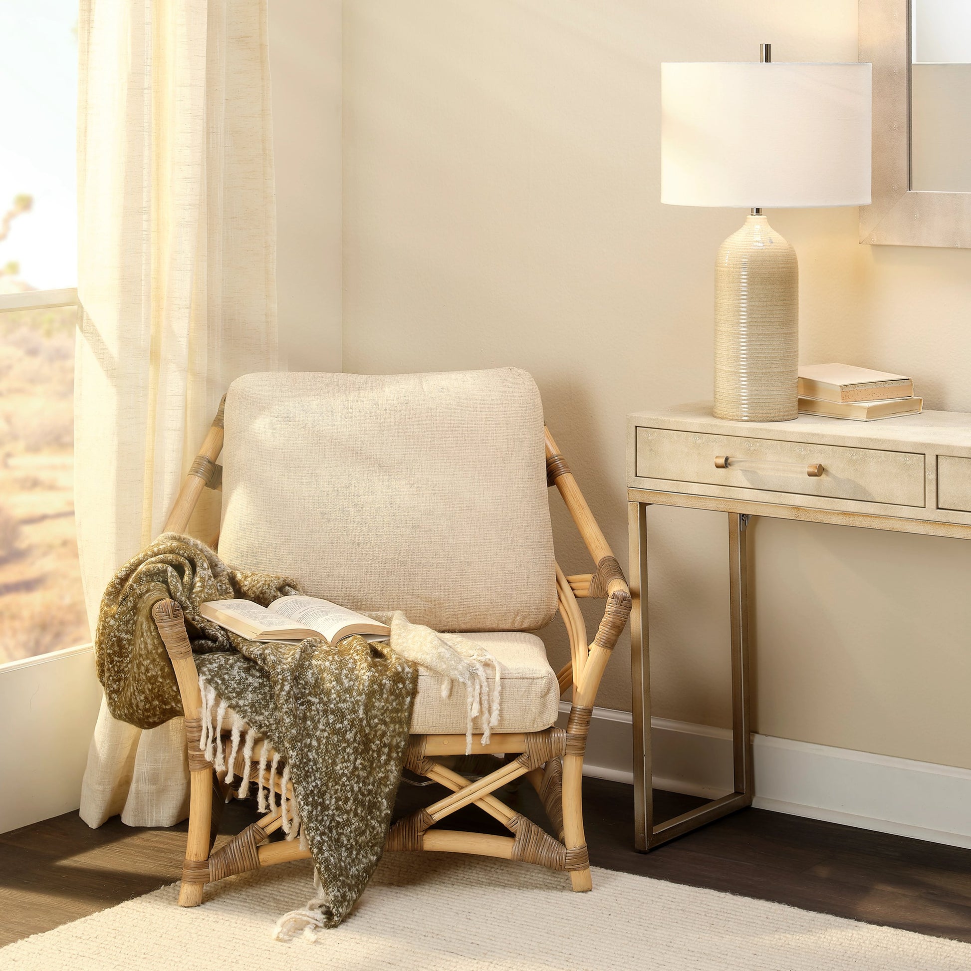 Dune Lounge Chair by Jamie Young in natural. Made from rattan, natural muslin fabric in a coastal style.