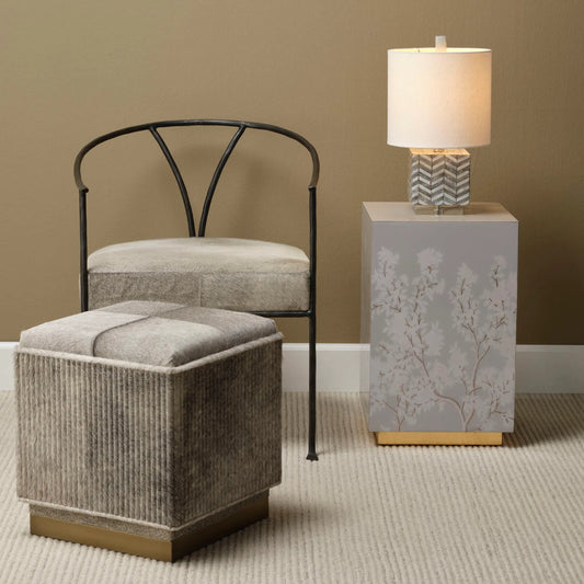 Easton Ottoman by Jamie Young. Made from hair on hide, mdf, metal: iron in a unique style.