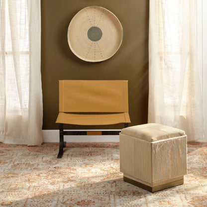 Easton Ottoman by Jamie Young. Made from hair on hide, mdf, metal: iron in a modern style.