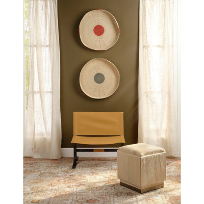 Easton Ottoman by Jamie Young. Made from hair on hide, mdf, metal: iron in a modern style.