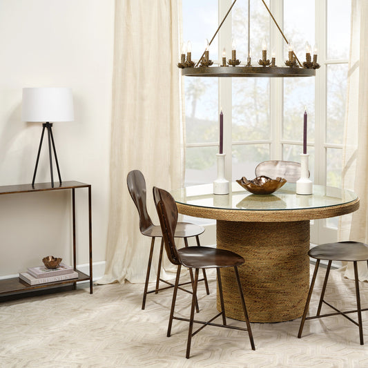 Harbor Round Bistro Table by Jamie Young. Made from seagrass with tempered glass in a coastal style.