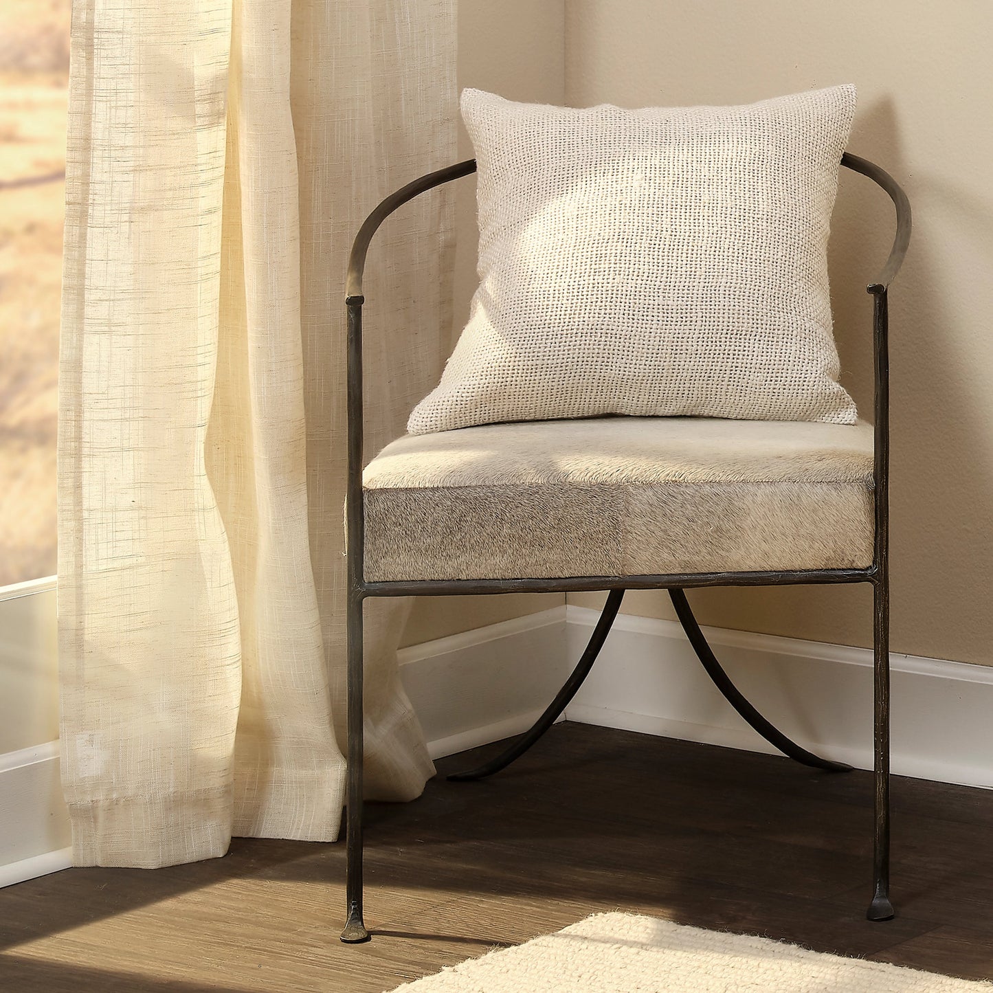 009 SI-1822201 | Lifestyle | Kai Chair by Jamie Young in grey hide, black hand forged iron. Made from grey hide, black hand forged iron in a transitional style.