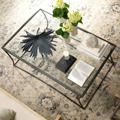 Kai Coffee Table by Jamie Young in black. Made from forged iron, clear tempered glass top in a modern style.