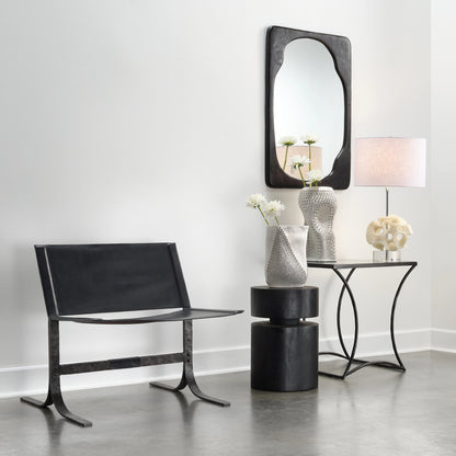 Kai Side Table by Jamie Young in black. Made from forged iron, clear tempered glass top in a modern style.
