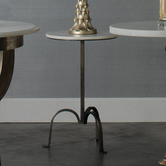 Left Bank Marble Table by Jamie Young in white marble with gun metal iron base. Made from metal in a modern style.