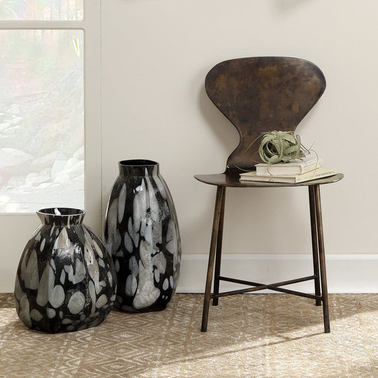 Mccallan Metal Chair by Jamie Young in acid washed metal. Made from iron in a rustic style.