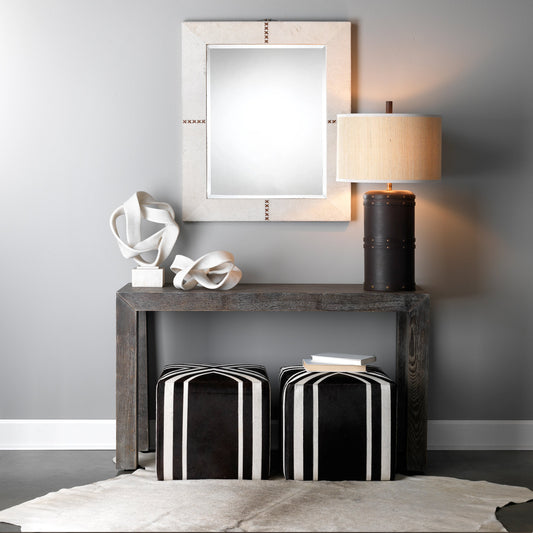 Nantucket Criss Cross Ottoman by Jamie Young in espresso. Made from hair on hide in a modern style.