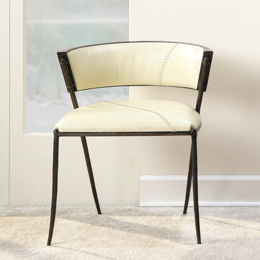 Nevado Chair by Jamie Young in off white & black. Made from leather & steel in a modern style.