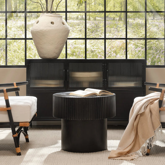 Notch Round Side Table by Jamie Young. Made from mango wood in a modern style.