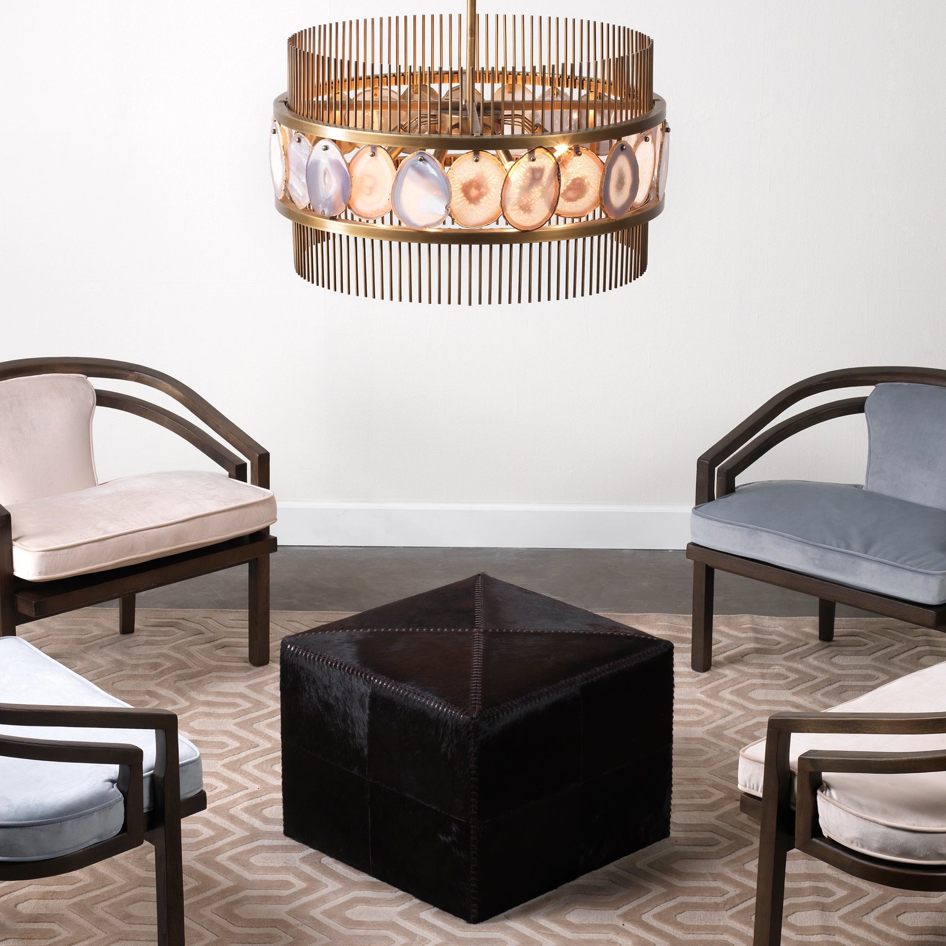 Large Ottoman by Jamie Young. Made from leather in a modern style.