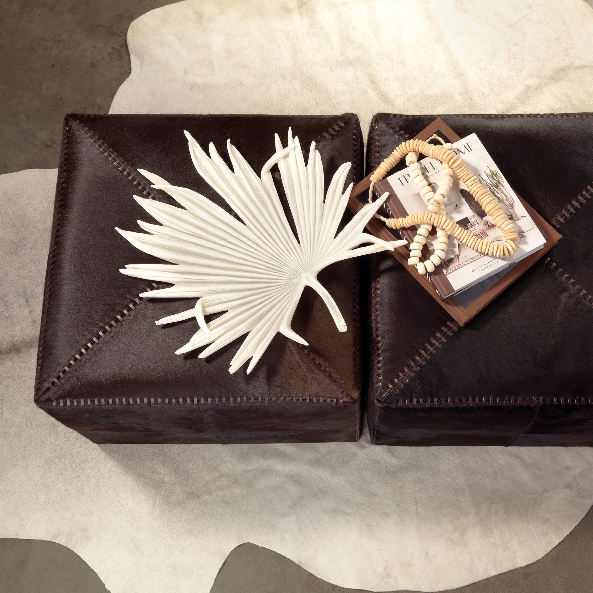 Large Ottoman by Jamie Young. Made from leather in a modern style.
