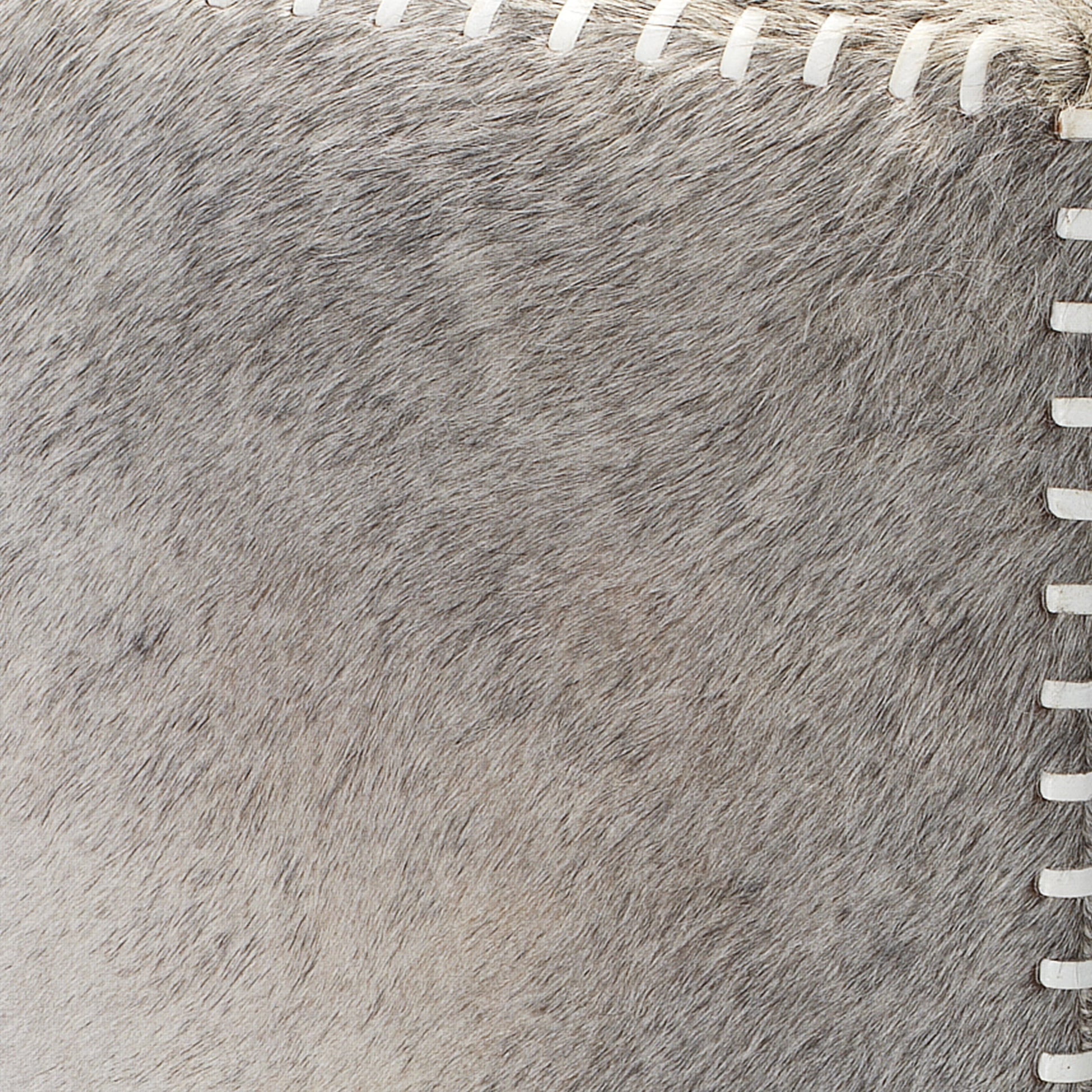 Large Ottoman by Jamie Young. Made from leather in a modern style.