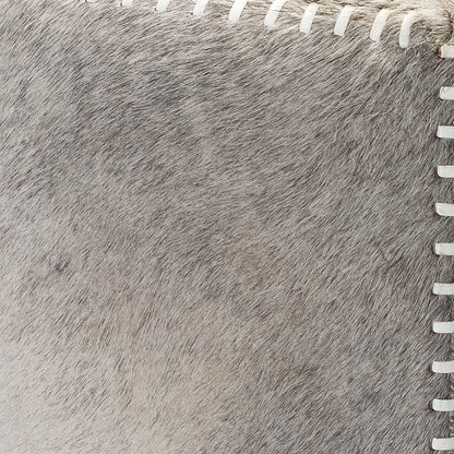 Large Ottoman by Jamie Young. Made from leather in a modern style.