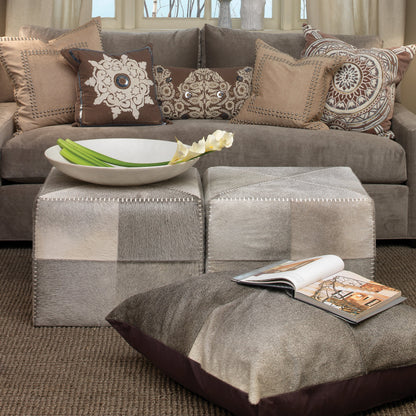 Large Ottoman by Jamie Young. Made from leather in a modern style.