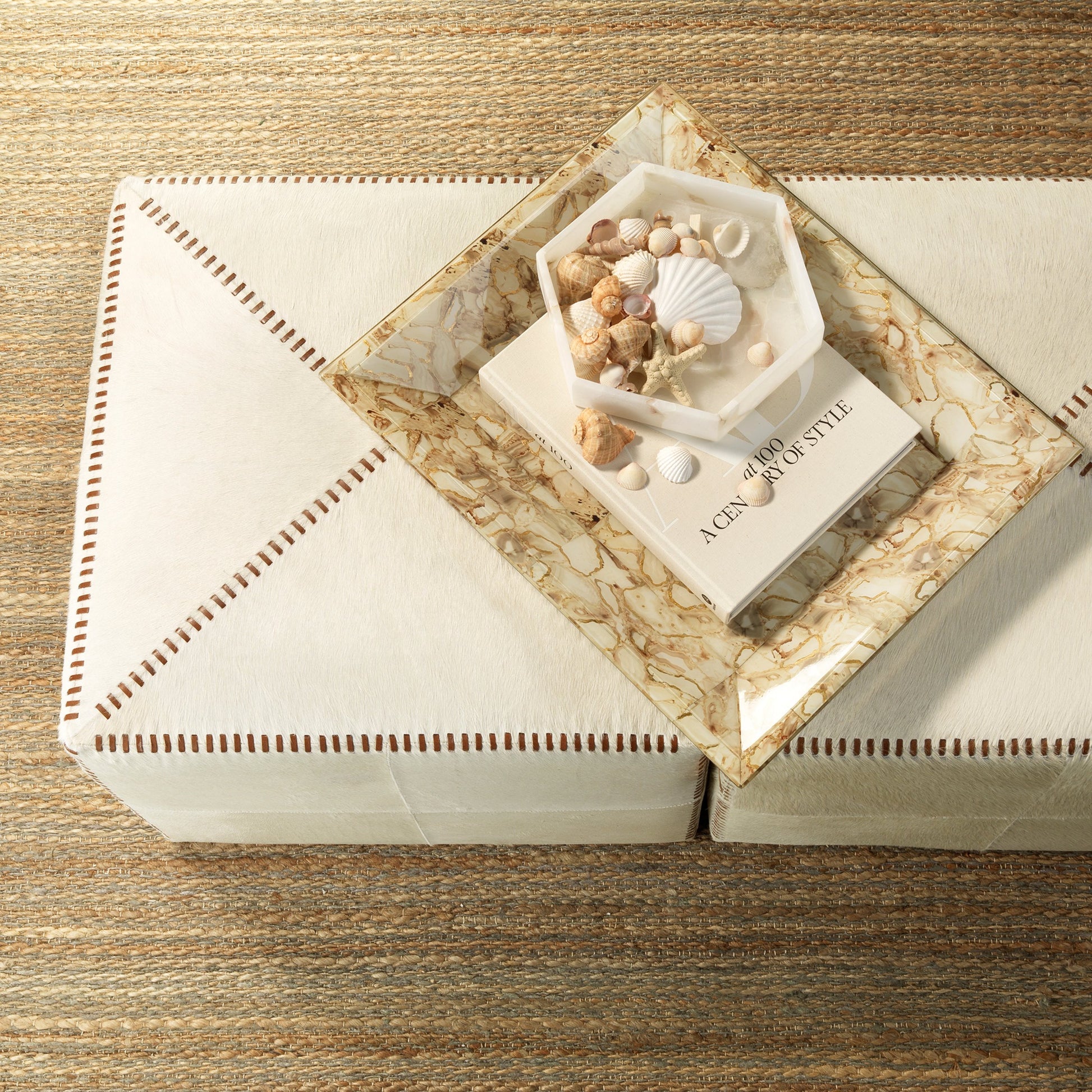 Large Ottoman by Jamie Young. Made from leather in a modern style.
