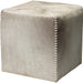 Small Ottoman by Jamie Young. Made from leather in a modern style.