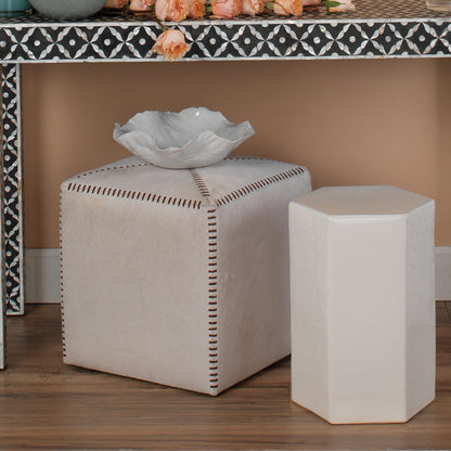 Small Ottoman by Jamie Young. Made from leather in a modern style.