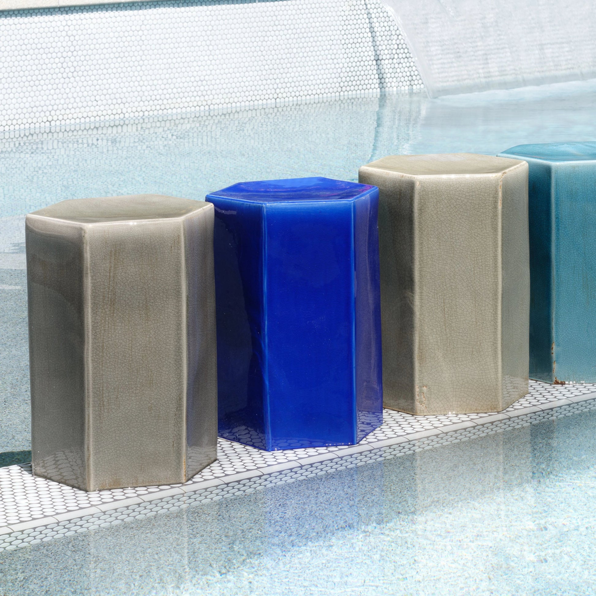 Porto Side Table by Jamie Young. Made from ceramic in a eclectic & global style.
