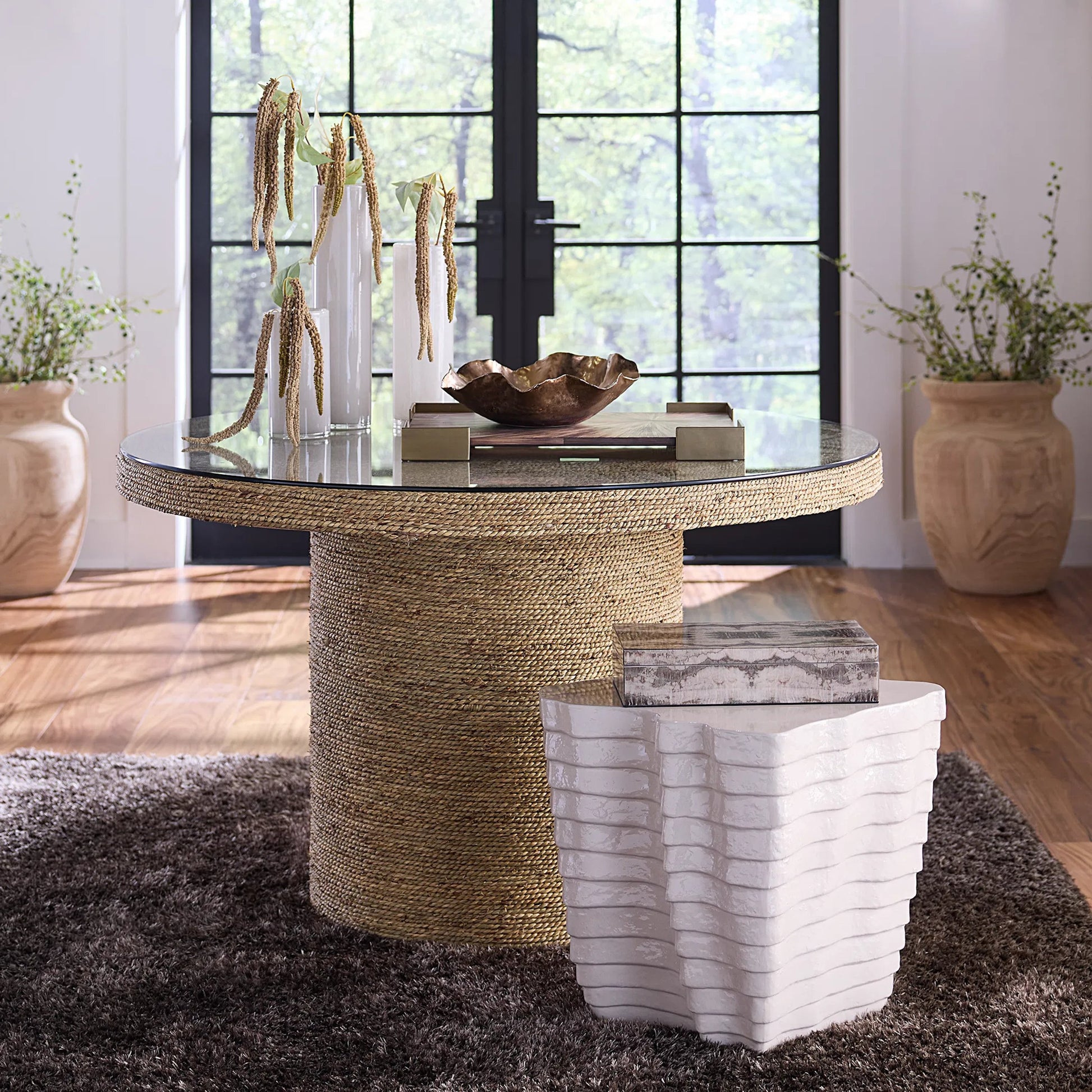 Strata Side Table by Jamie Young. Made from concrete in a unique style.