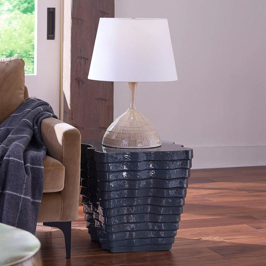 Strata Side Table by Jamie Young. Made from concrete in a unique style.