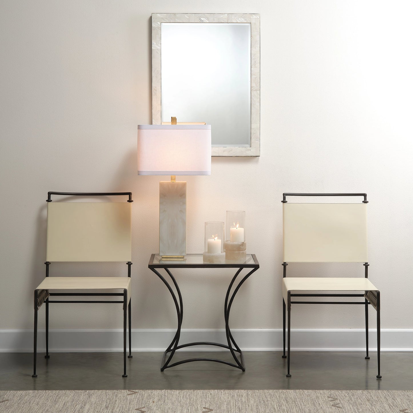 013 SI-1822231 | Lifestyle | Sweetwater Dining Chair by Jamie Young in off white leather & black forged iron. Made from leather, forged iron in a modern style.