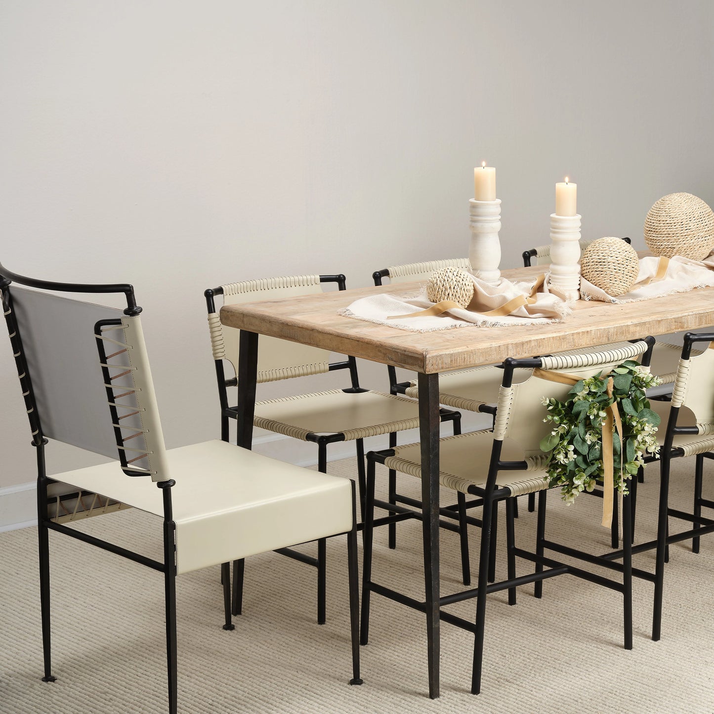 011 SI-1822231 | Lifestyle | Sweetwater Dining Chair by Jamie Young in off white leather & black forged iron. Made from leather, forged iron in a modern style.