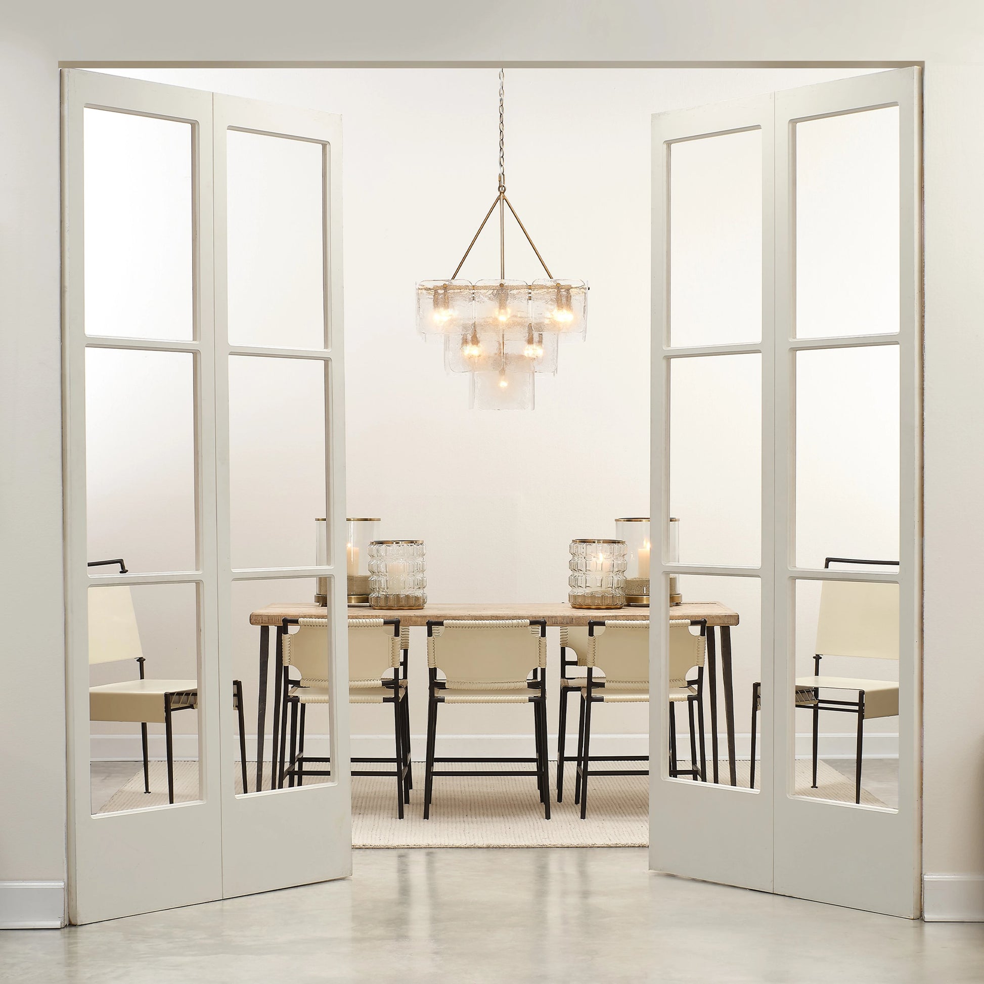 Sweetwater Dining Chair by Jamie Young in off white leather & black forged iron. Made from leather, forged iron in a modern style.
