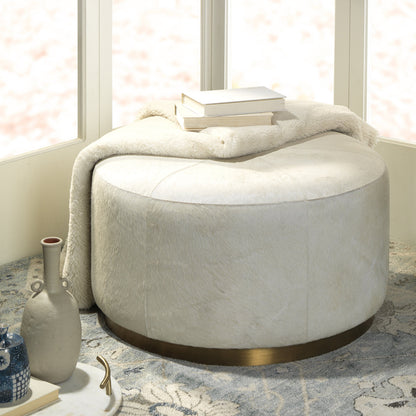 Thackeray Pouf by Jamie Young. Made from hide in a modern style.
