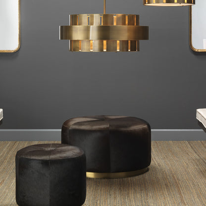 Thackeray Pouf by Jamie Young. Made from hide in a modern style.