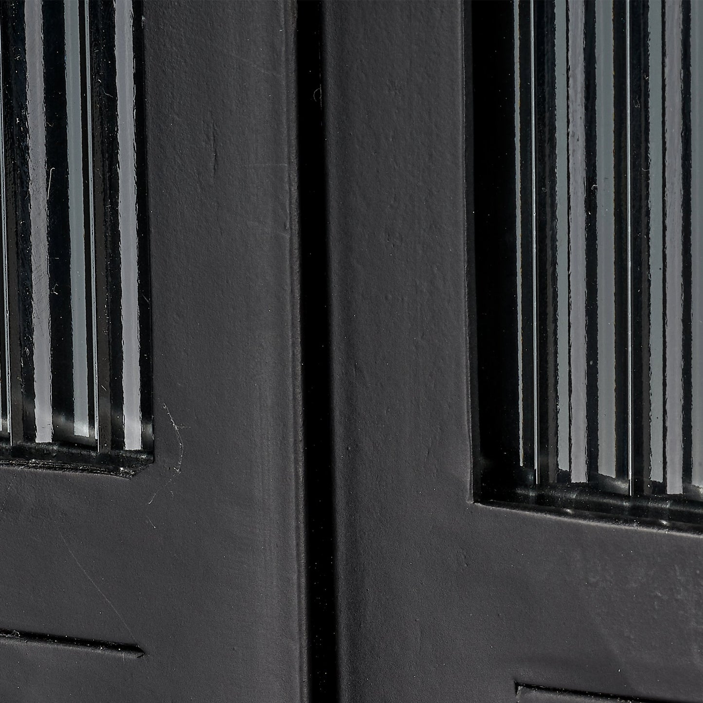 005 SI-1961339 | Closeup | Vitrino Dresser by Jamie Young in black. Made from iron & glass in a modern style.