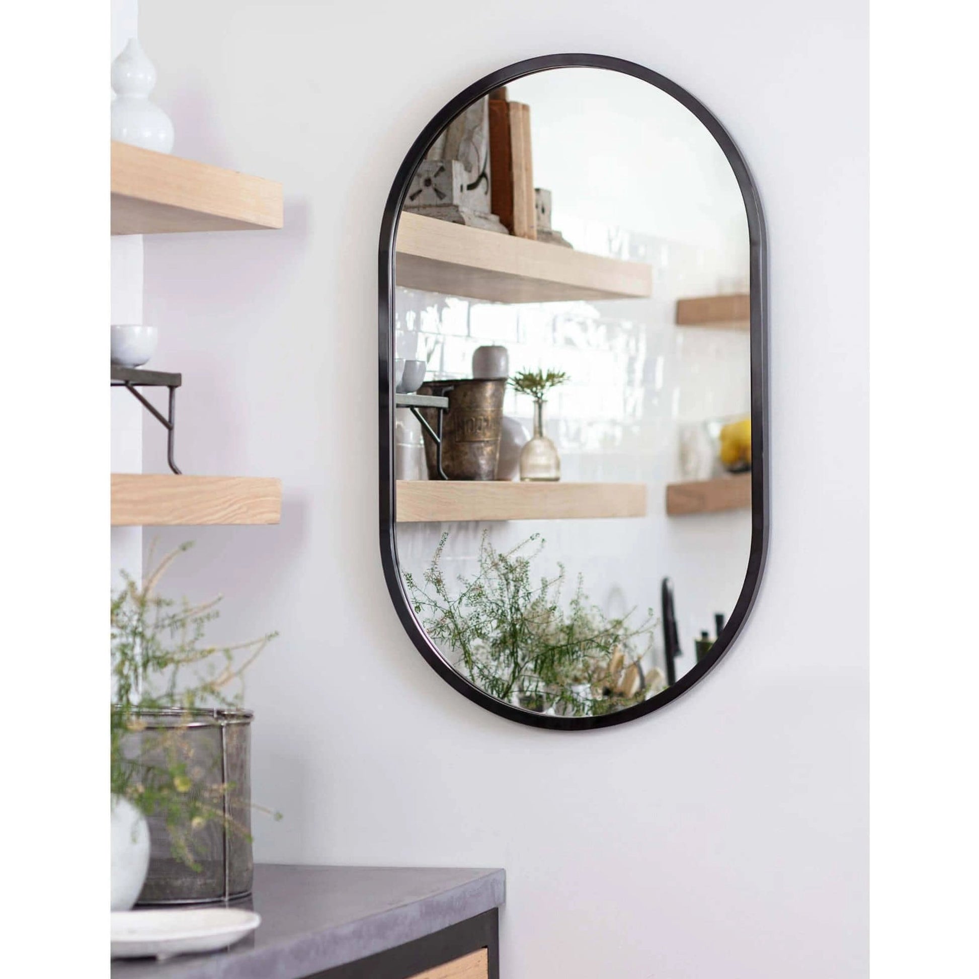Canal Mirror by Regina Andrew. Made from stainless steel in a modern style.