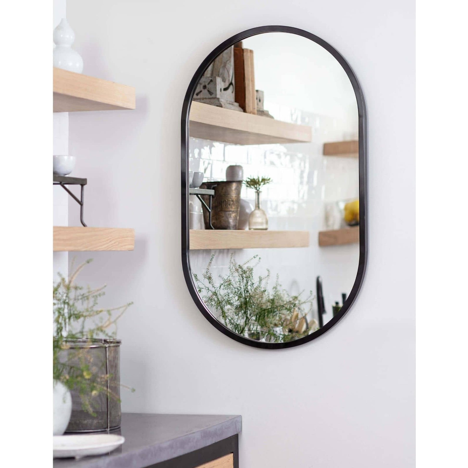 Canal Mirror by Regina Andrew. Made from stainless steel in a modern style.