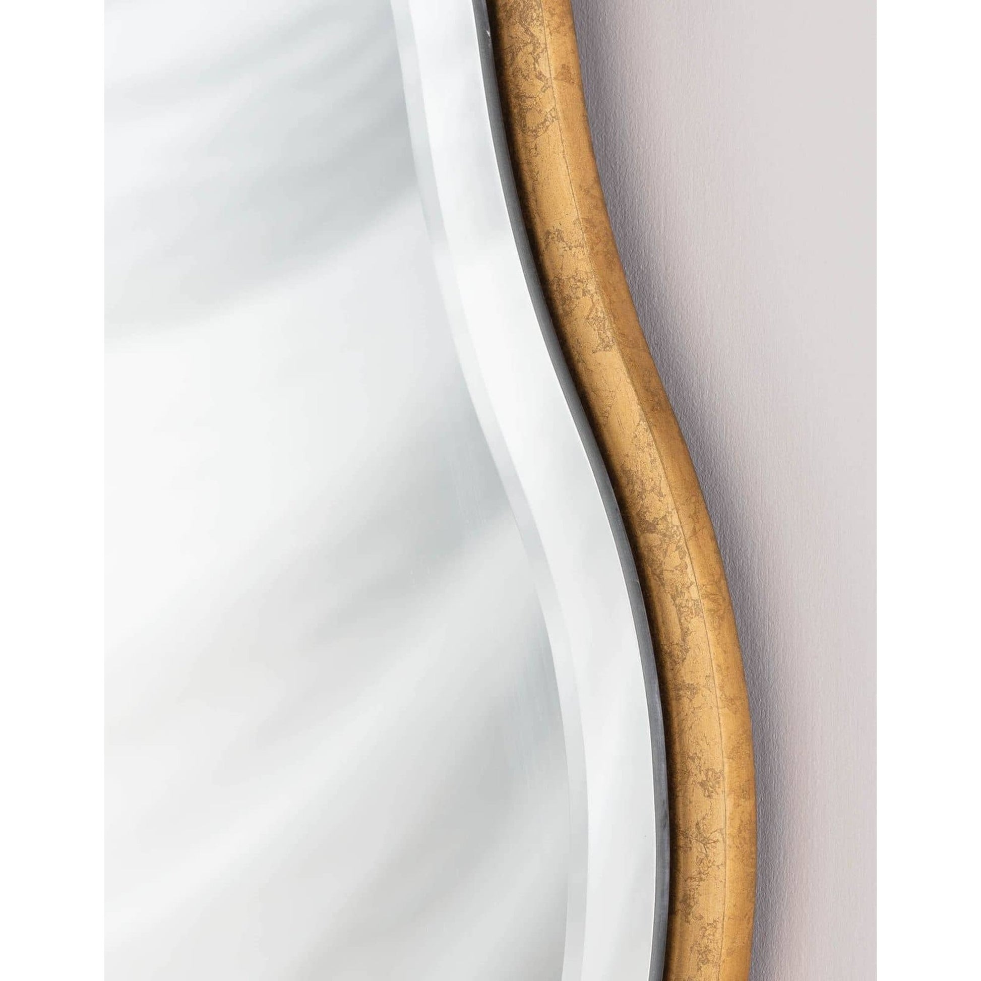 Candice Round Mirror by Regina Andrew in gold and gold leaf. Made from resin in a transitional style.