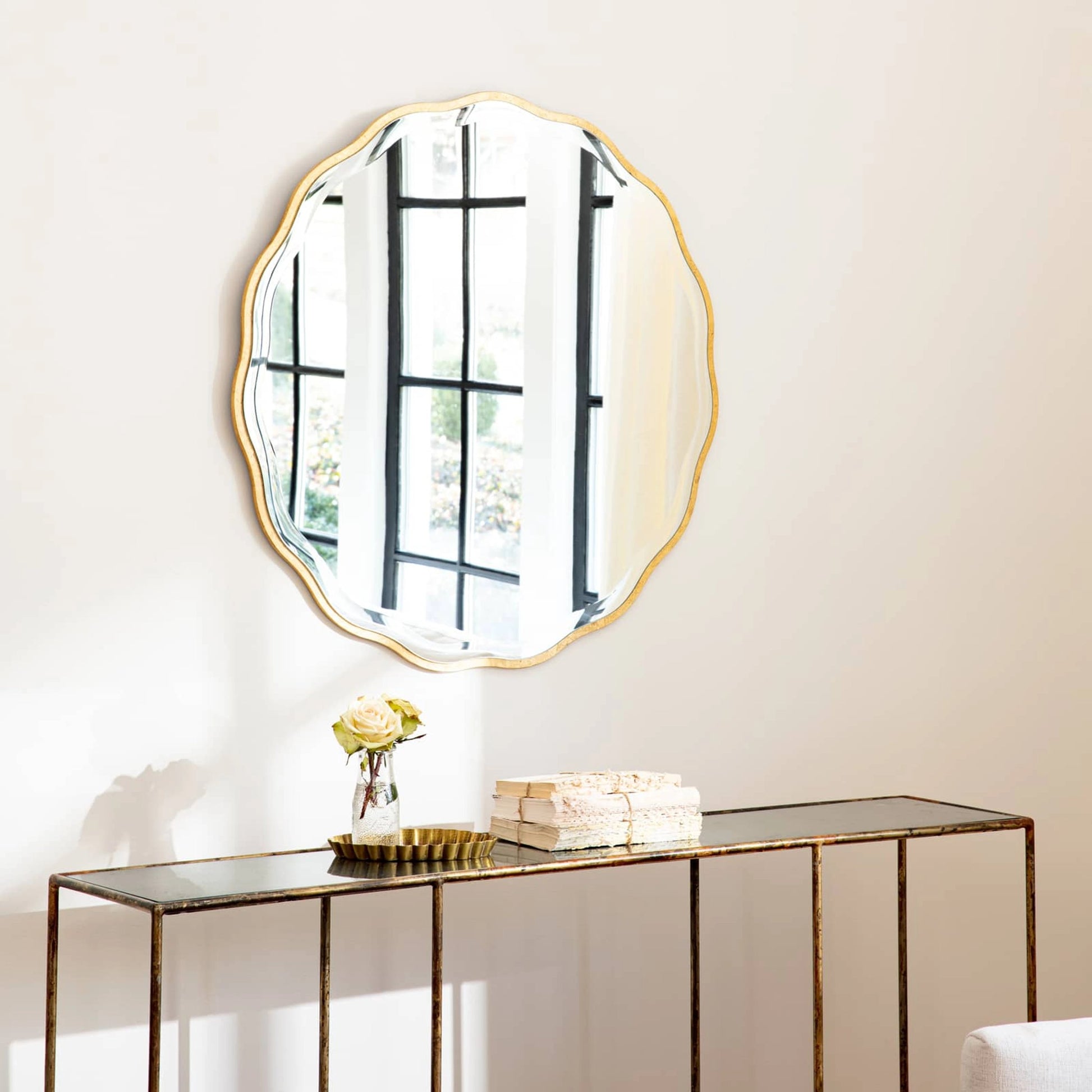 Candice Round Mirror by Regina Andrew in gold and gold leaf. Made from resin in a transitional style.