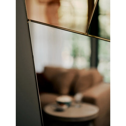 Iris Mirror by Regina Andrew in clear and gold. Made from stainless steel in a unique style.