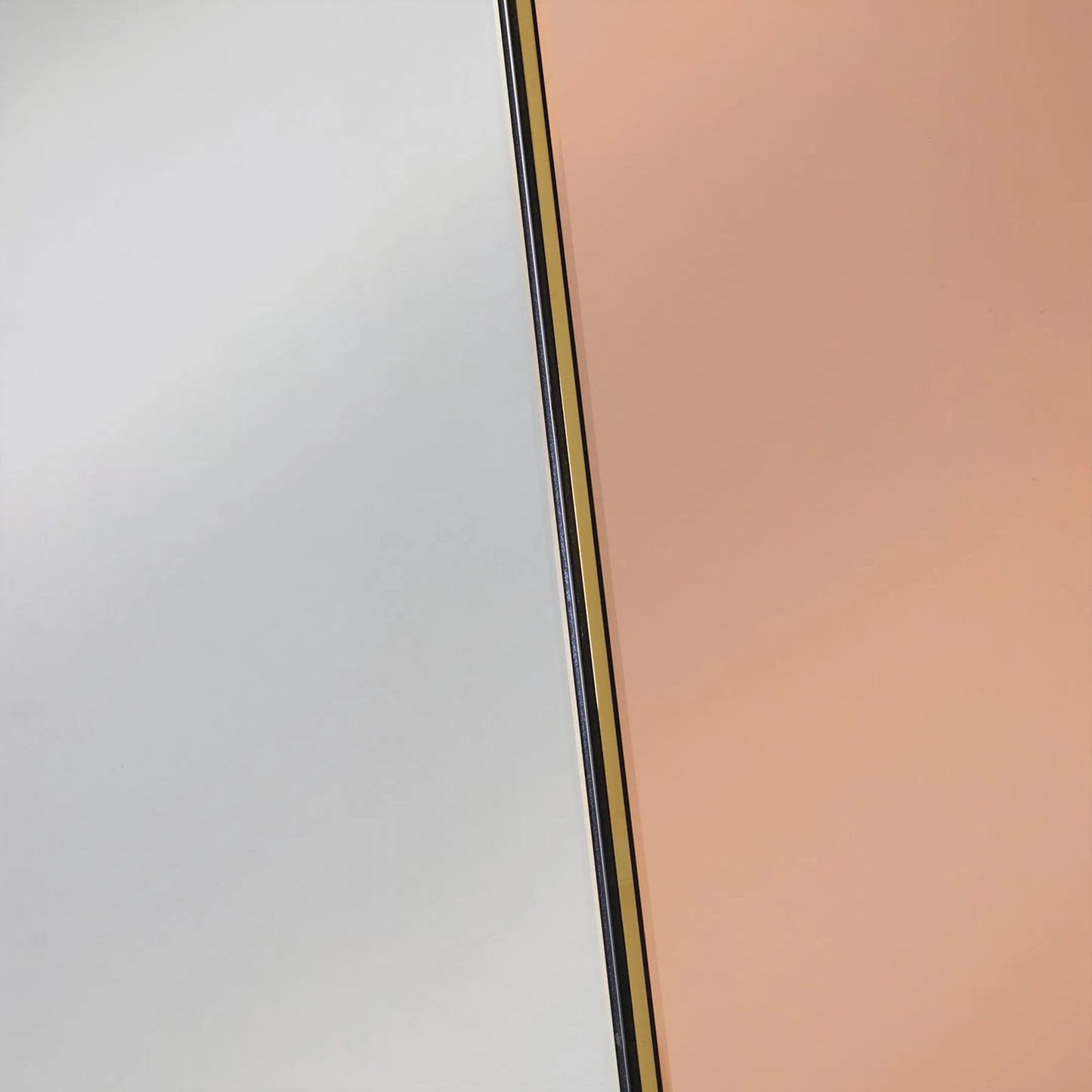 005 SI-2629030 | Closeup | Iris Mirror by Regina Andrew in clear and gold. Made from stainless steel in a unique style.