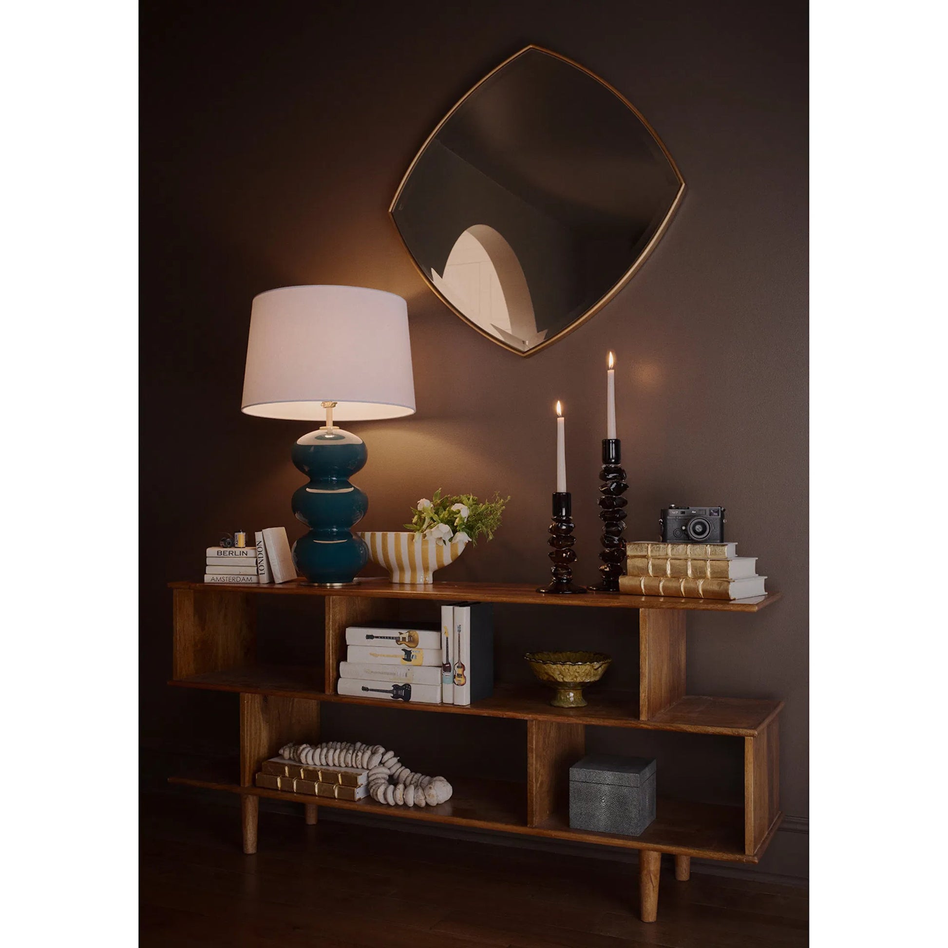 Gem Mirror by Regina Andrew in gold and antique gold leaf. Made from resin in a unique style.