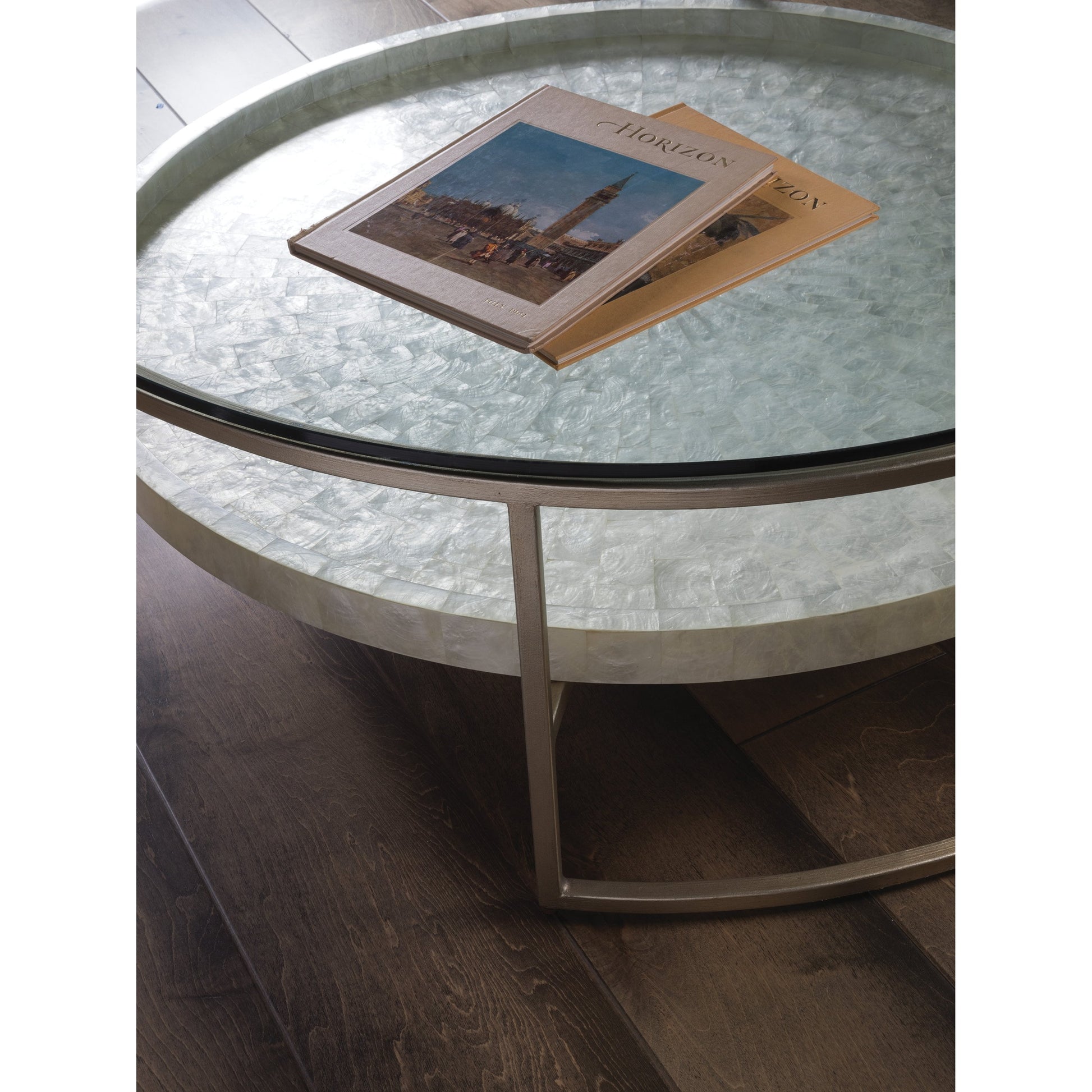 Cumulus Capiz Cocktail Table by Artistica Home in champagne. Made from unique in a modern style.