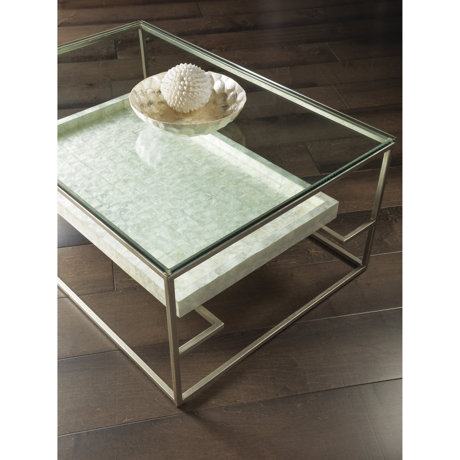 Cumulus Capiz Cocktail Table by Artistica Home in champagne. Made from unique in a modern style.