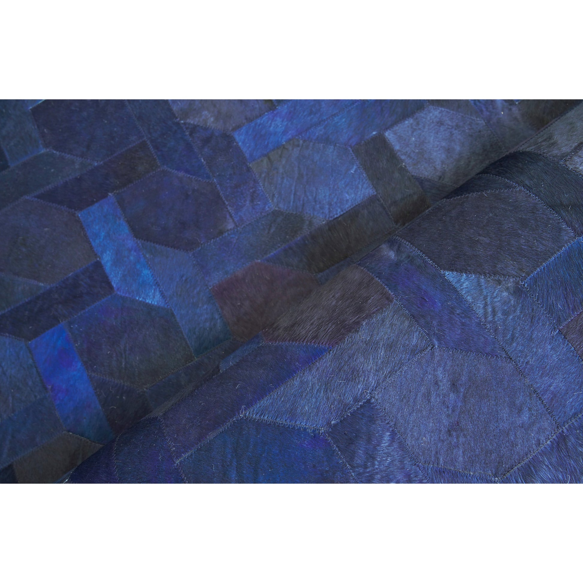 Natural Hide Rug by Exquisite Rugs. Made from leather hide in a unique style.