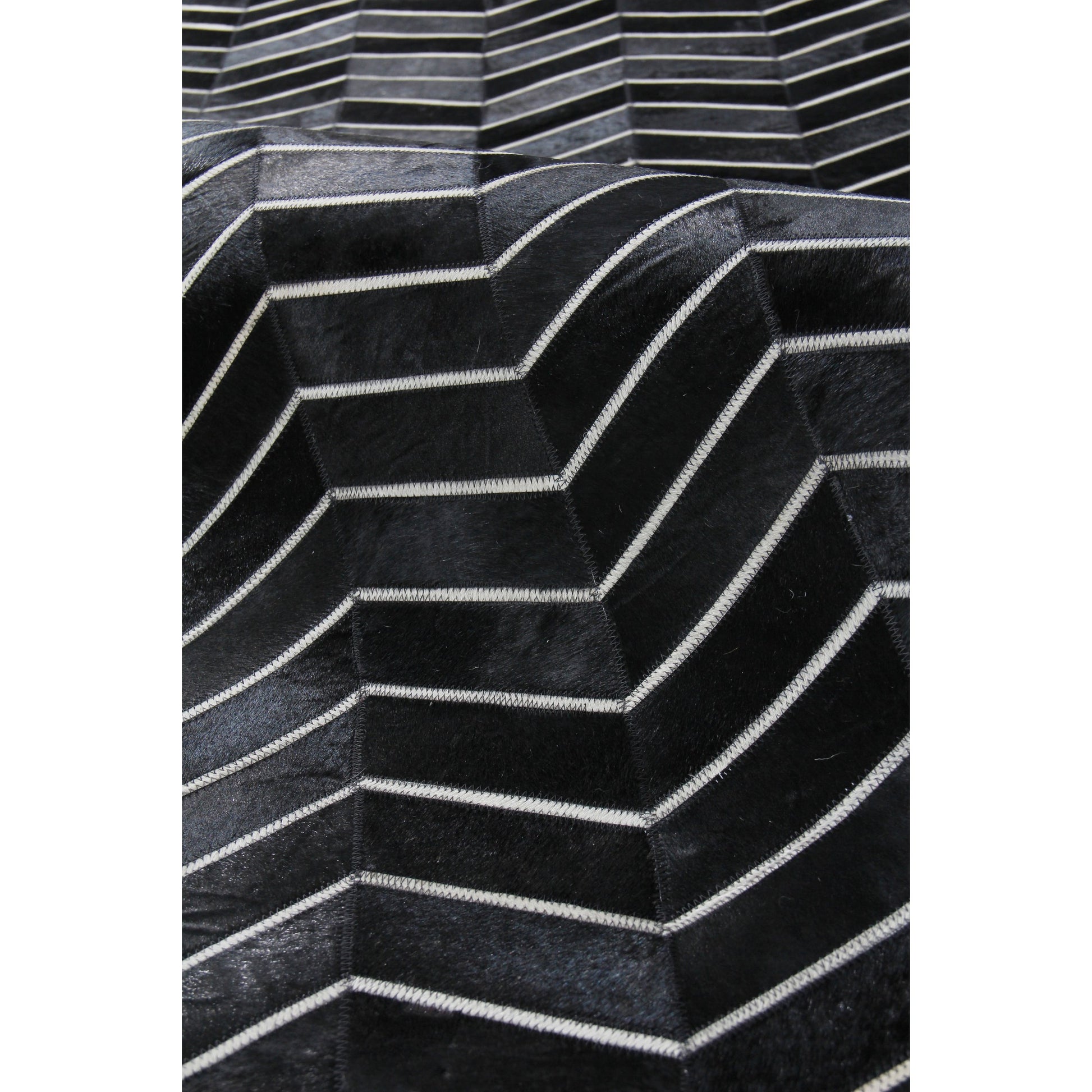 Natural Hide Rug by Exquisite Rugs. Made from leather hide in a unique style.
