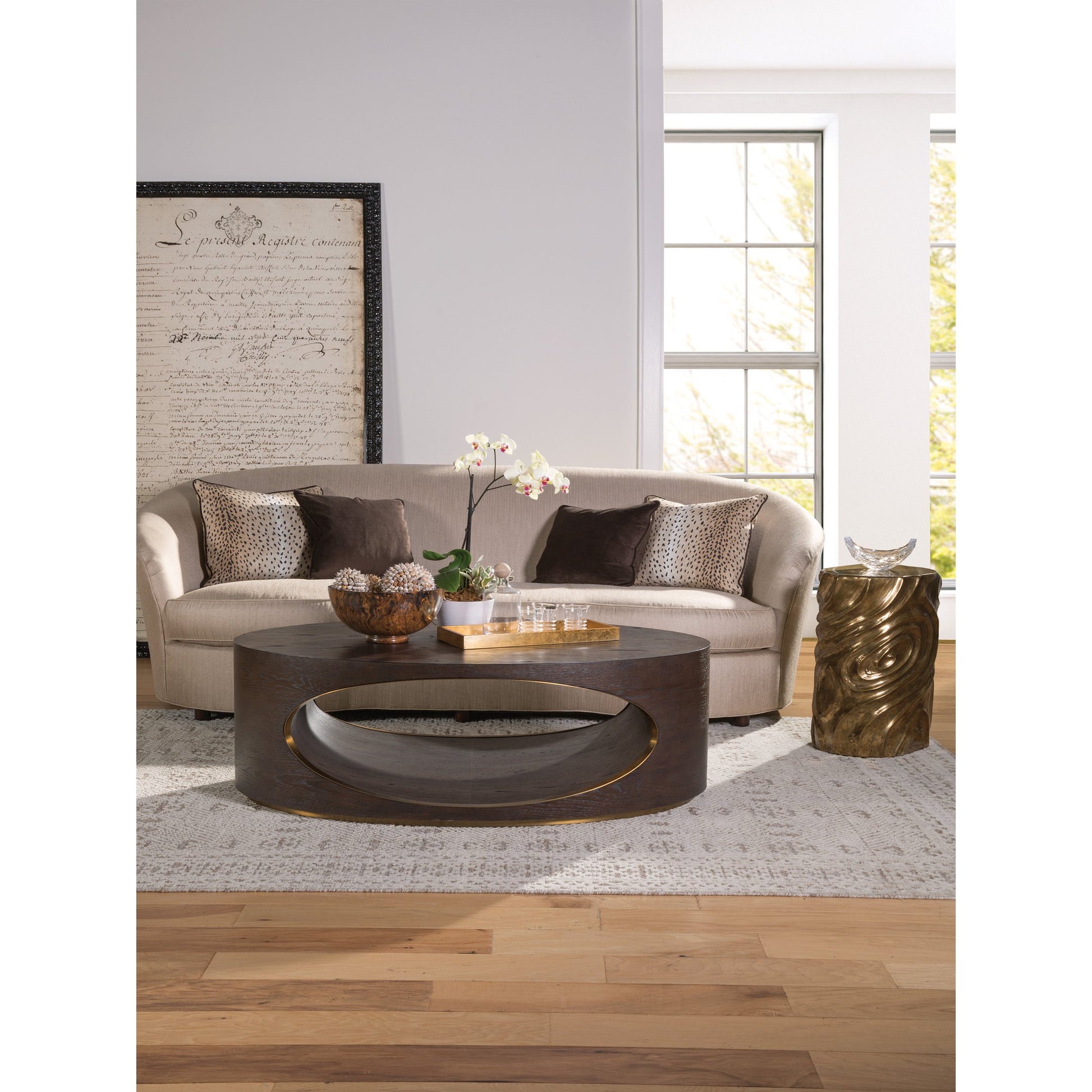 Verbatim Oval Cocktail Table by Artistica Home in rich brown cerused. Made from unique in a modern style.