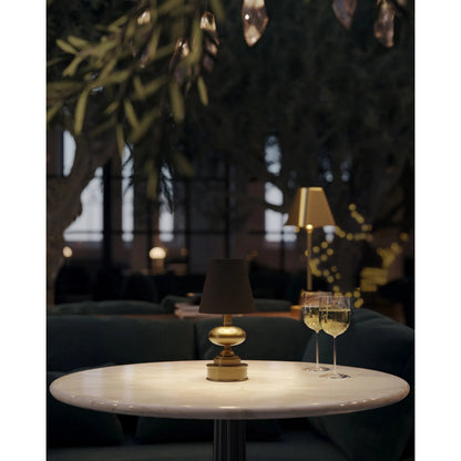 Galavant Cordless Table Lamp by Currey and Company in brass. Made from metal in a modern style.