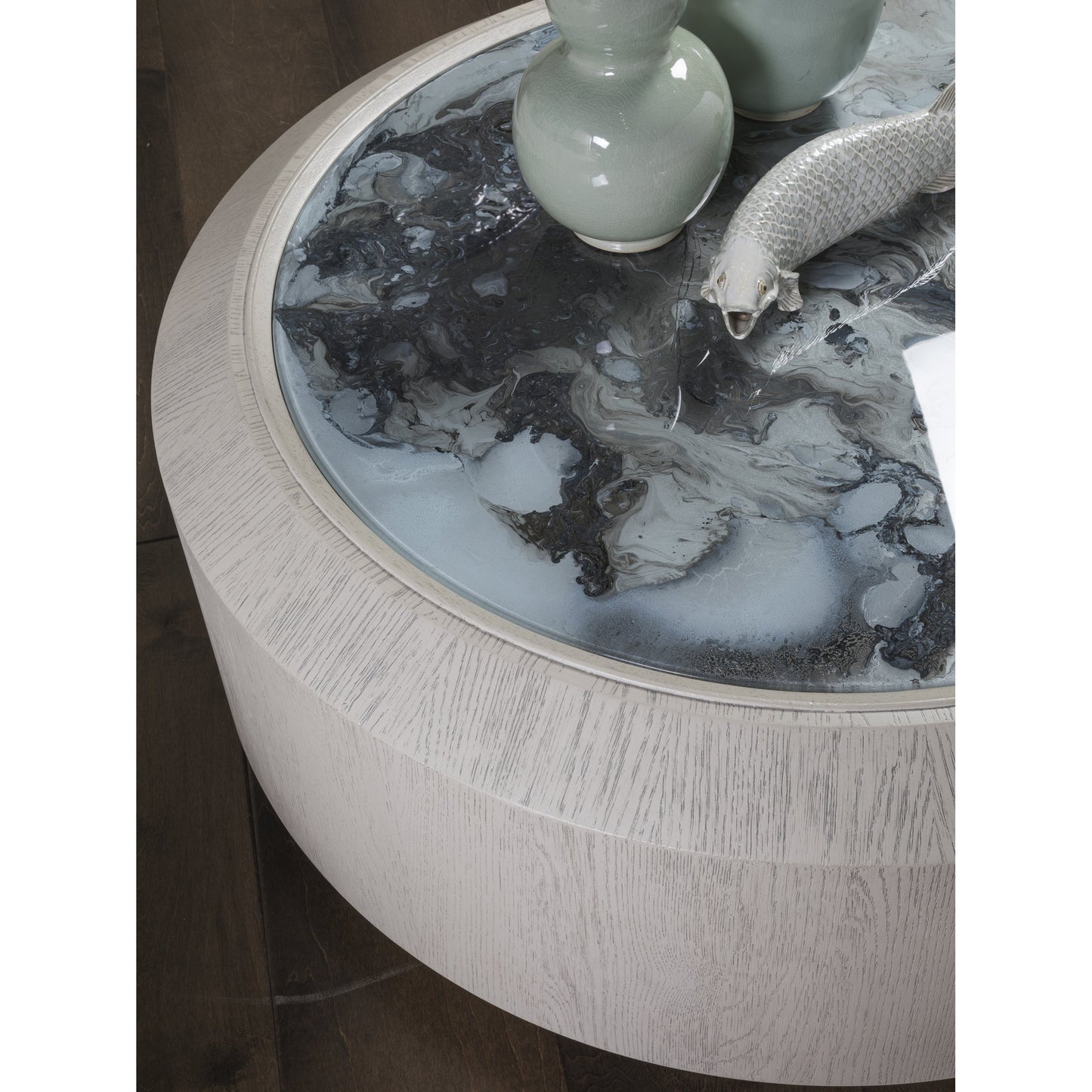 002 SR-834445 | Closeup | Metaphor Round Cocktail Table by Artistica Home in white sandblast. Made from unique in a modern style.