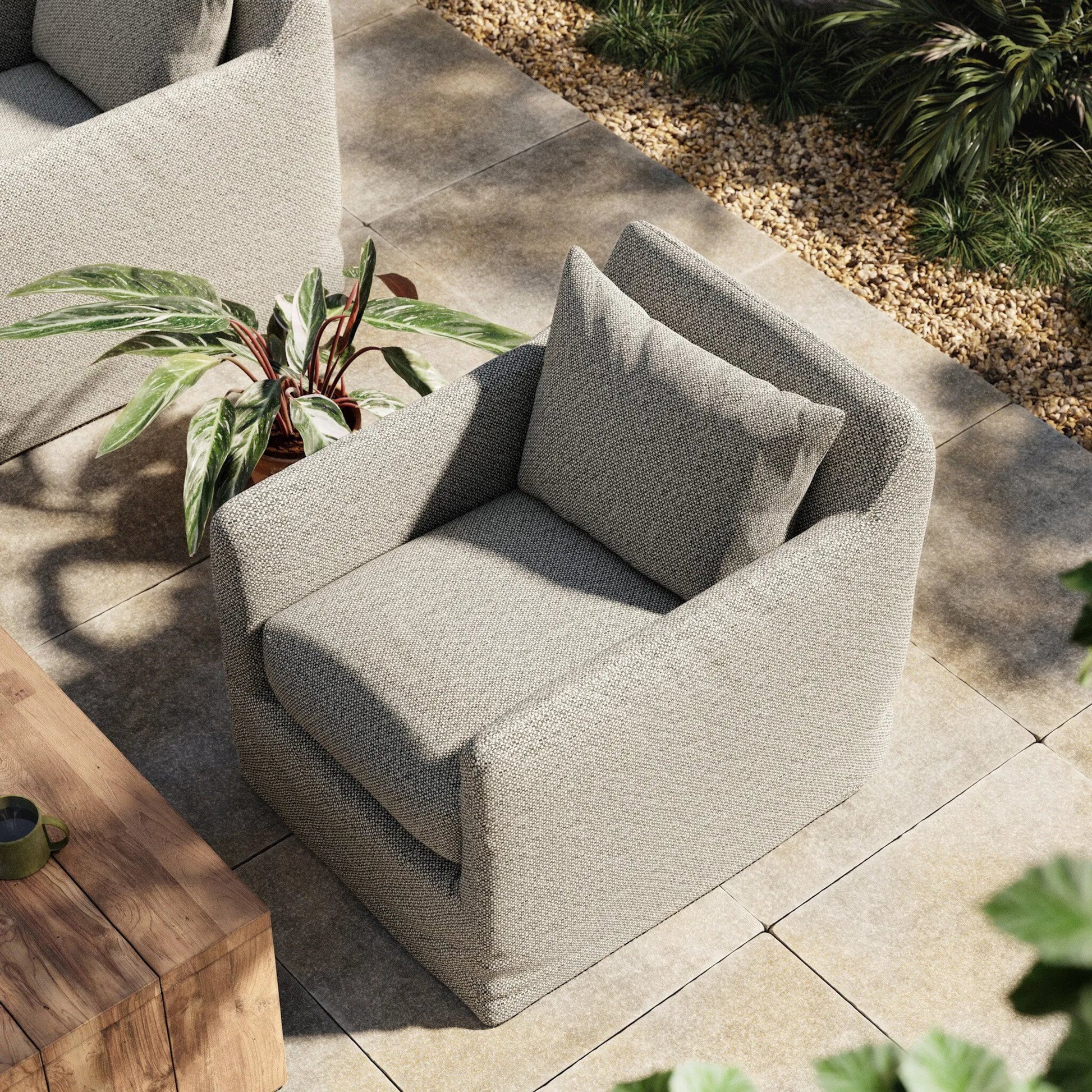 Dade Outdoor Swivel Chair by Four Hands. Made from 100% olefin, aluminum in a modern style.