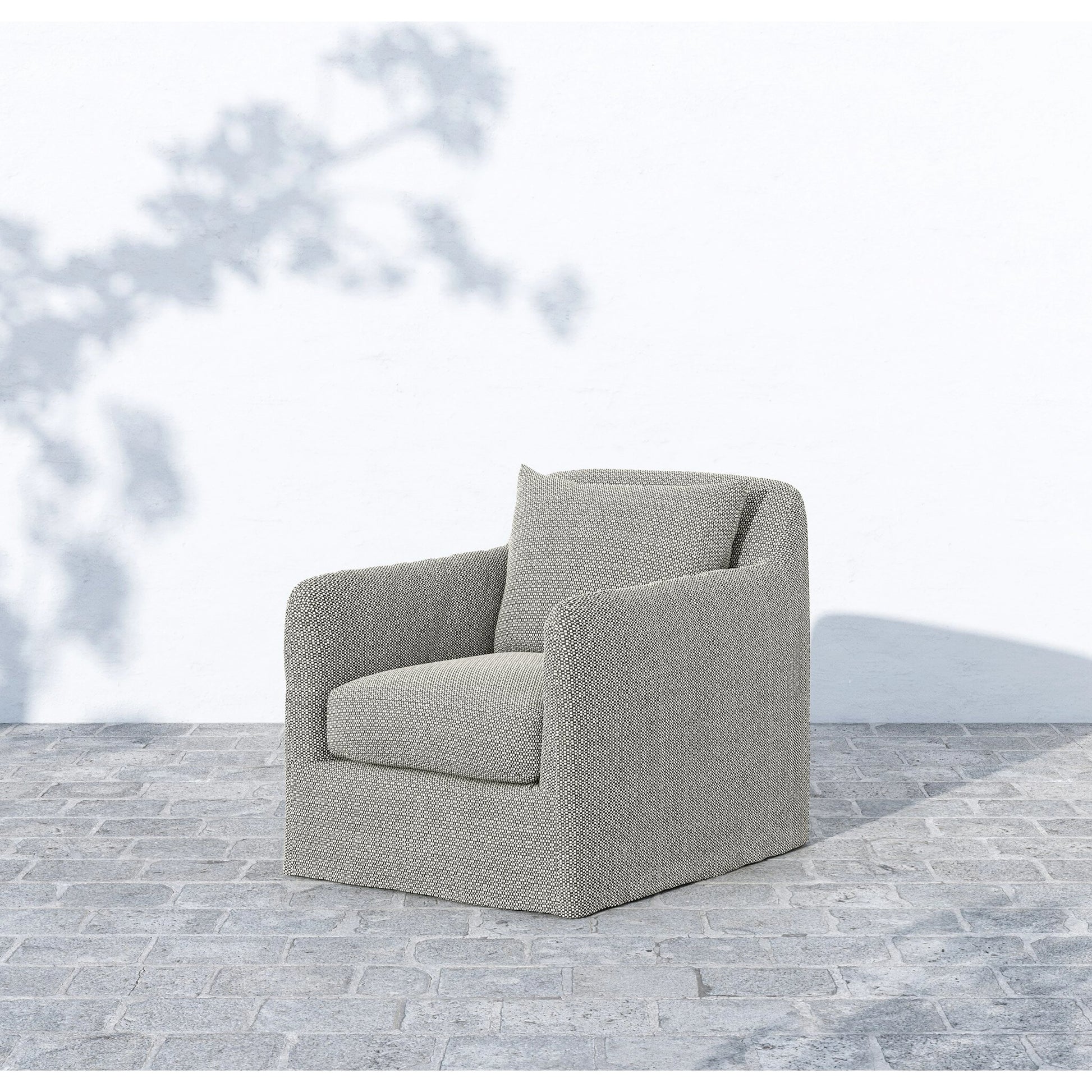 Dade Outdoor Swivel Chair by Four Hands. Made from 100% olefin, aluminum in a modern style.