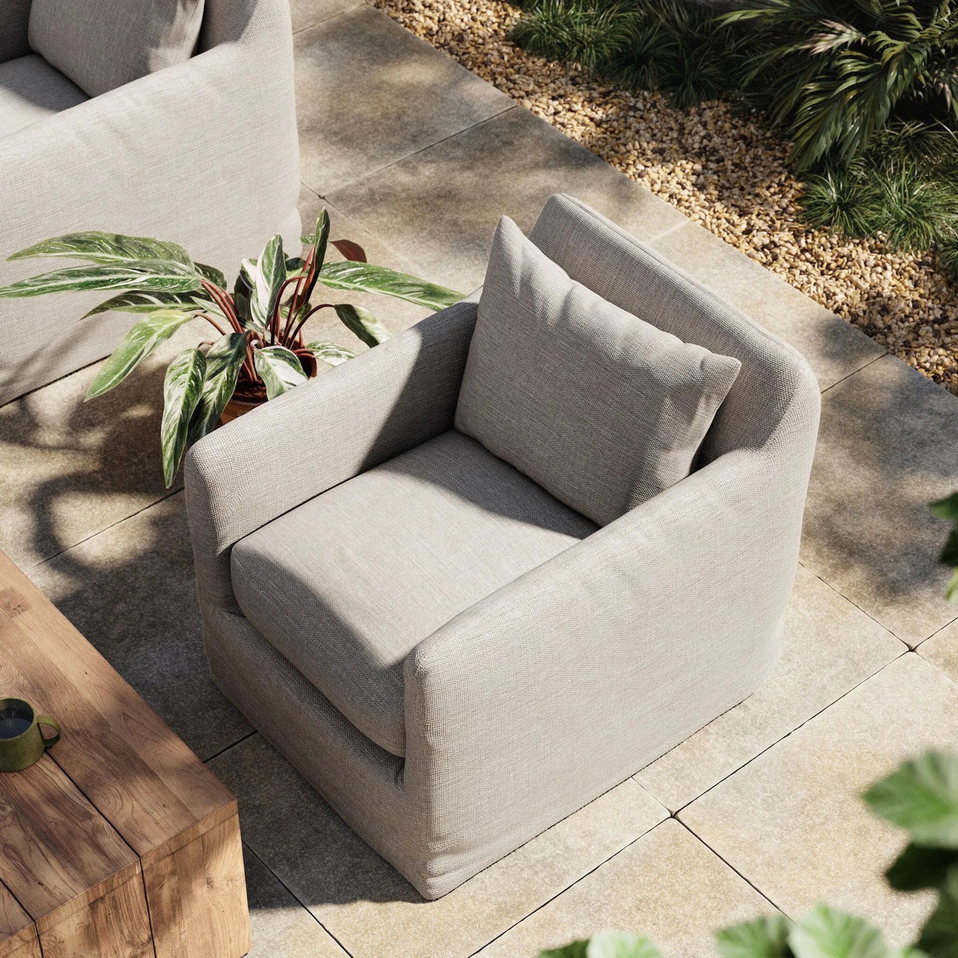 Dade Outdoor Swivel Chair by Four Hands. Made from 100% olefin, aluminum in a modern style.