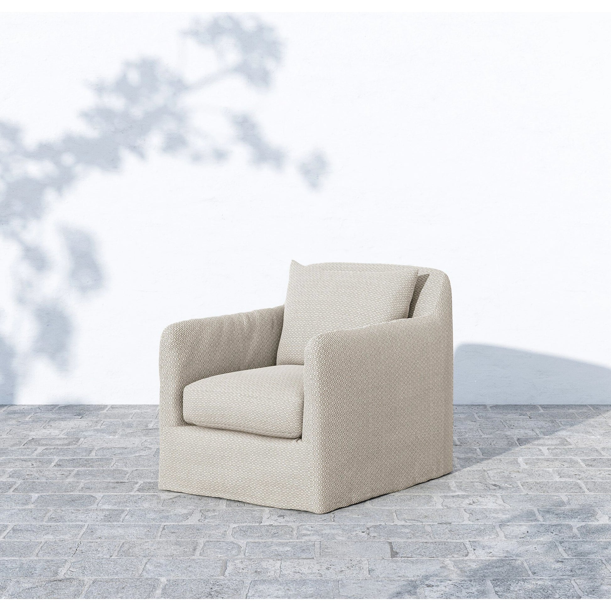 Dade Outdoor Swivel Chair by Four Hands. Made from 100% olefin, aluminum in a modern style.
