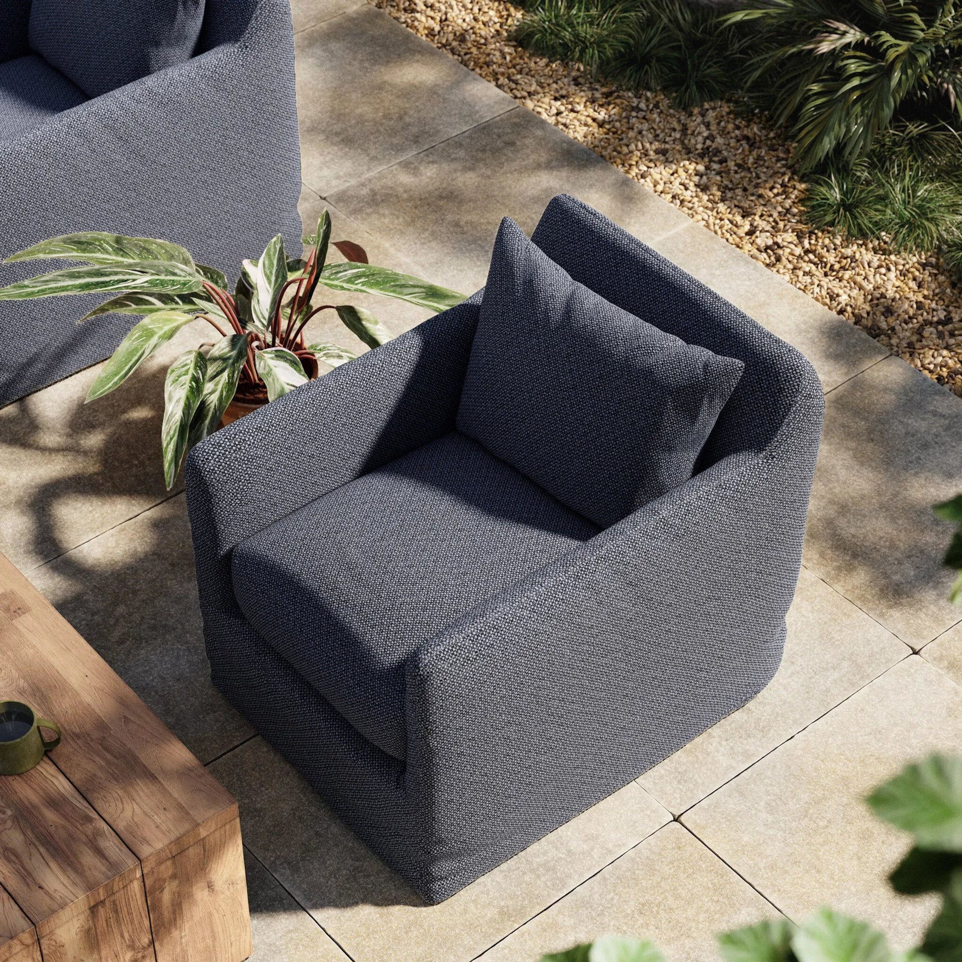 Dade Outdoor Swivel Chair by Four Hands. Made from 100% olefin, aluminum in a modern style.